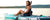 Woman kayaking on gili inflatable paddle board