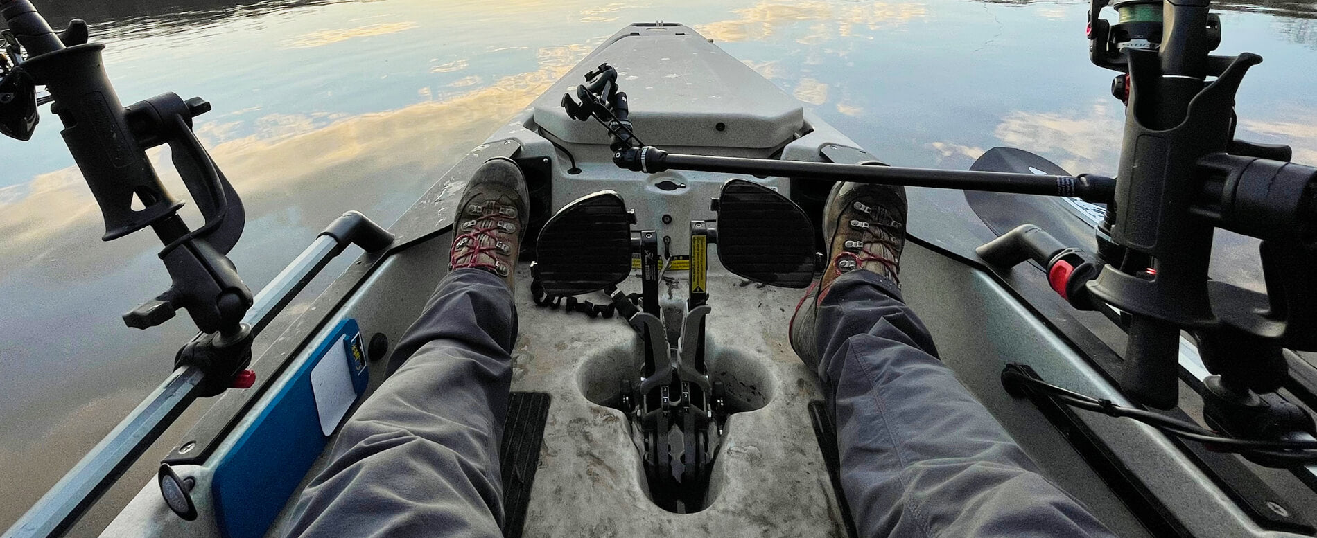 Pedal kayak with a fishing rod